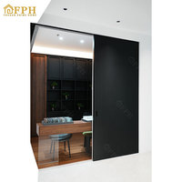 Dernier design de porte coulissante miroir gain de place, système de porte coulissante Ghost haut de gamme à cadre en aluminium moderne, intérieur en verre trempé