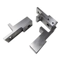 Pièces de rechange mécaniques sur mesure ODM : Bloc de positionnement en acier usiné CNC, Plaque de connexion en aluminium