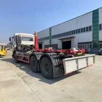 Camion benne à déchets Howo 6x4 20 tonnes 25 tonnes avec bras de ramassage Ampliroll, camion benne à déchets à crochet