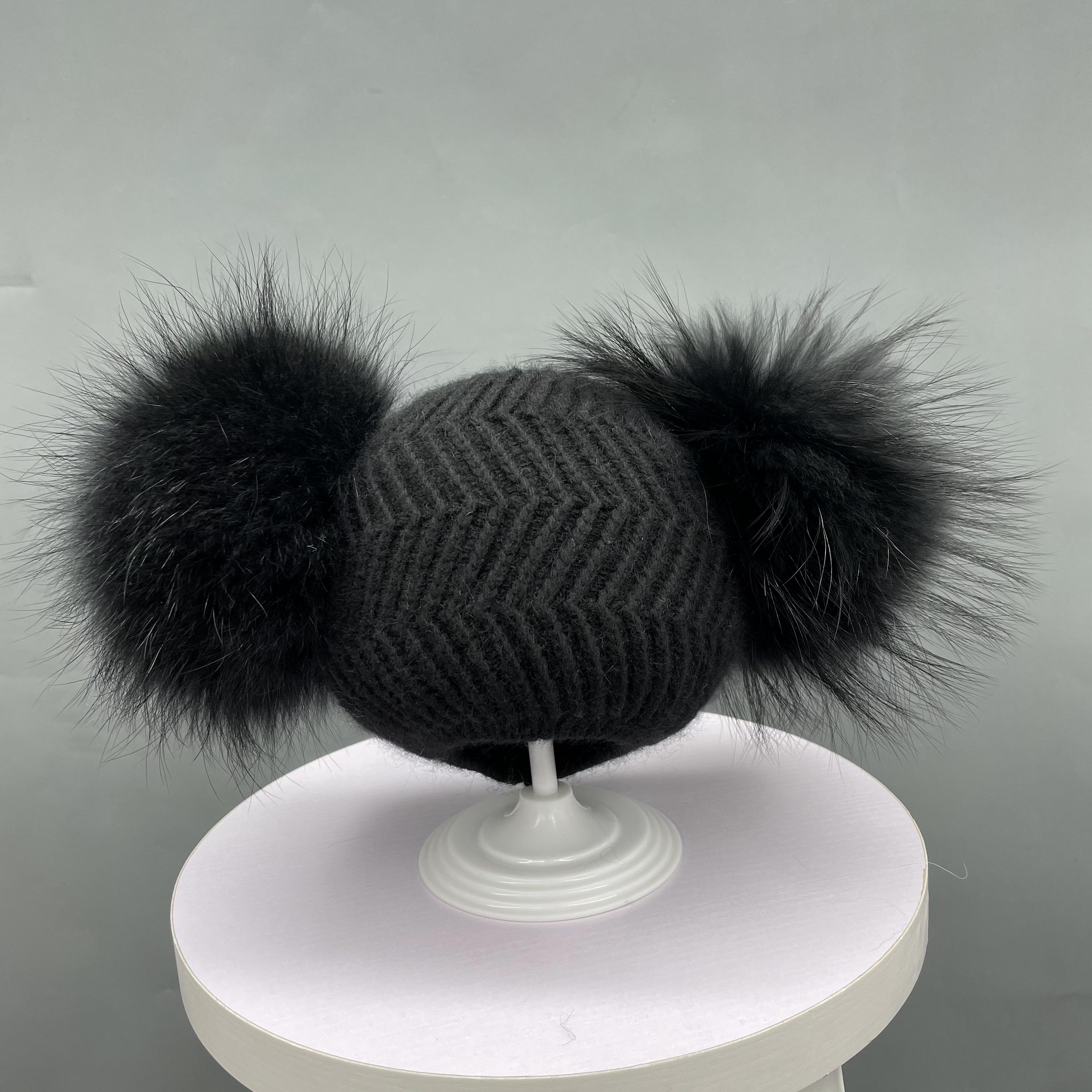 Boules de poils noires doubles