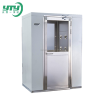 Douche d'air industrielle pour portes roulantes avec buses rotatives multi-groupe pour un soufflage omnidirectionnel du fret