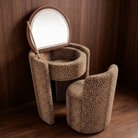 Table de toilette ronde en velours capitonné avec miroir éclairé par LED, tabouret de coiffeuse imbriqué pour petit appartement ou chambre.