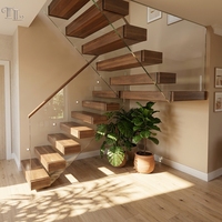 Escalier flottant moderne Tanlong en noyer foncé avec garde-corps en verre sans cadre, main courante en bois massif, escalier cantilever à montantes ouvertes