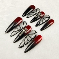 Venta al por mayor mariposa dibujada a mano negro y rojo uñas artacrílicas prensa en las uñas