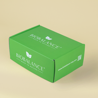 Boîte d'expédition postale en carton ondulé pour cosmétiques, couleur rose personnalisée, avec impression de logo, pour l'envoi de produits de beauté.