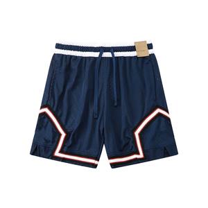 Pantalones Cortos Deportivos de Baloncesto para Hombre, de Poliéster de Color Sólido con Impresión Personalizada al por Mayor - Product Image 1