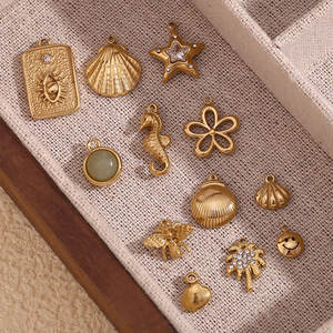 Colgantes y dijes de moda de acero inoxidable 316L chapados en oro PVD de 14K y 18K personalizados para la fabricación de joyas. - Product Image 1