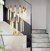Long lustre de lampe d'escalier de luxe simple moderne avec phare rotatif en métal rond en verre pour Villa Loft Appartement Salon
