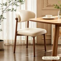 Chaise de salle à manger rembourrée avec cadre en acier au carbone léger et moderne, personnalisable pour hôtels et cafés