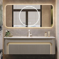 Meuble-lavabo mural moderne personnalisé blanc crème cannelé avec plateau en marbre, double éclairage LED et coins arrondis pour hôtel