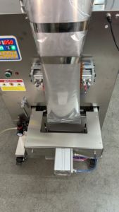 Machine d'emballage alimentaire robuste, remplisseuse <span class=keywords><strong>de</strong></span> sacs, scelleuse, coupeuse, étiqueteuse pour granulés, feuilles <span class=keywords><strong>de</strong></span> thé, bonbons, chips - Product Image 4