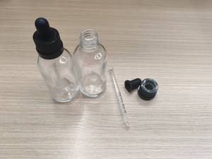 Approvisionnement d'usine 30ml 50 ml Flacon compte-gouttes en verre CR rond Flacon de <span class=keywords><strong>teinture</strong></span> d'huile essentielle avec bouchon résistant aux enfants Pipette graduée - Product Image 3