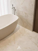 Dalle en porcelaine Statuario White à veissures subtiles 600x1200mm, grand format, pour sol et mur, aspect sans joint, idéale pour villa, appartement, salon