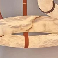 Lustre circulaire moderne en onyx et marbre, avec sangle en cuir, suspension LED anti-éblouissement en pierre, idéal pour hôtels et restaurants – Vente directe usine
