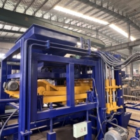 Machine hydraulique entièrement automatique à haute production QT7-15 pour la fabrication de briques creuses et de pavés