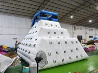 Structure de jeu aquatique gonflable géante avec mur d'escalade, toboggan aquatique et iceberg gonflable pour parc aquatique
