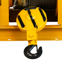 Treuil électrique robuste en ligne avec télécommande, capacité de charge de 1T, idéal pour le levage de marchandises sur les chantiers de construction et en entrepôt