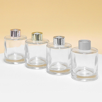 Vente flash : flacon diffuseur d'aromathérapie rond en verre de 100 ml avec impression sérigraphique, bouchon personnalisé et ouverture facile
