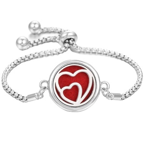 Bracelet diffuseur d'huiles essentielles en acier inoxydable à motif cœur pour bijoux - Product Image 1