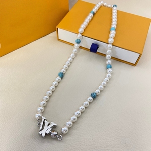 ชุดเครื่องประดับผู้หญิงสุดหรูทันสมัย แบรนด์ดัง จี้ตัวอักษรเคลือบสีน้ำเงิน ประดับมุก สร้อยคอและกำไลข้อมือดีไซน์เนอร์ - Product Image 1