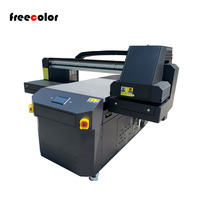 Freecolor kualitas tinggi 70*100cm ukuran 3 kepala 6090 Model UV Flatbed Printer dengan pernis warna untuk kayu/kaca/cetakan akrilik