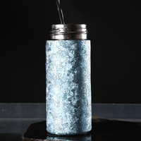 Petite bouteille d'eau thermos en métal de 200ml Mini bouteille de poche isolée double couche de 200ml Bouteille en titane pur