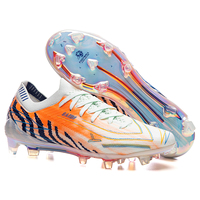 Chaussures de football en vente directe d'usine, collection Printemps-Hiver 2026, toutes saisons, crampons de football, tige en mesh, semelle intermédiaire en TPU, semelle extérieure en TPU, durables