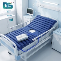 Matelas d'air alternatif pour lit d'hôpital avec pompe pour la prévention des escarres et le massage thérapeutique pendant les soins infirmiers