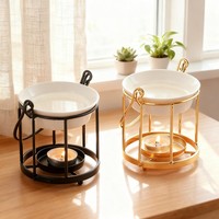 Nouveau brûleur à huile essentielle en céramique noire dorée, diffuseur de parfum, chauffe-cire décoratif avec poignée