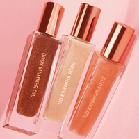 Nouvel arrivage de spray liquide à paillettes pigmentées, surligneur scintillant pour le corps, huile scintillante pour le corps de marque privée vegan naturel imperméable