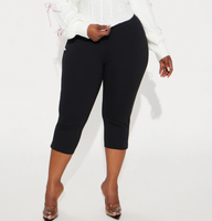 Pantalon Capri pour femme à taille élastique et taille haute, avec détail nœud, couleur unie, coupe évasée, ourlet fendu, coupe ample et respirant