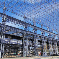 Atelier d'entrepôt en structure métallique industrielle avec conception à installation rapide et cadre métallique conforme aux normes ASTM