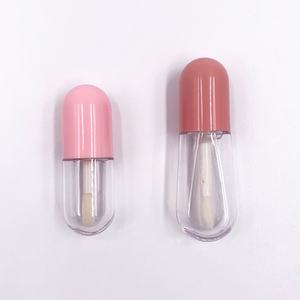 Vente en gros de tubes de gloss à lèvres vides ovales en plastique, personnalisables, avec couvercle noir, mignons et économiques, pour emballage de gloss à lèvres - Product Image 1