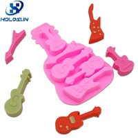 Individuelle Farbige Hitzebeständige Lebensmittelsichere Kuchendekoration 5-Gitter Coole 3D Silikon-Gitarren-Schokoladenformen für Kerzenherstellung