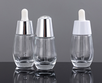 Vente en gros de flacons compte-gouttes en verre transparent de luxe personnalisés de 30 ml et 50 ml, contenants vides pour huiles essentielles, soins de la peau, sérums