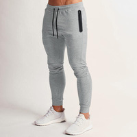 Pantalon de jogging respirant pour homme, taille élastique, logo personnalisé imprimé, polyester tissé, séchage rapide, fermeture éclair, grandes tailles