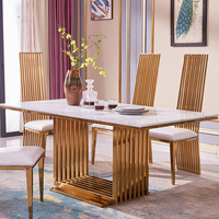 Table à manger moderne en pierre crème avec base rectangulaire en acier inoxydable doré pour hôtel, appartement, maison