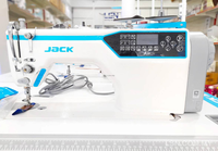 Machine à coudre industrielle à point noué à aiguille simple informatisée JACK A4F d'occasion avec table et support