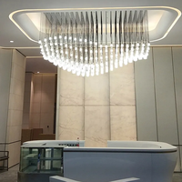 Lustre de salle à manger à coupe en cristal personnalisé de style moderne, de conception paramétrique créative