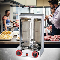 Machine commerciale de Kebab d'électricité de gaz multifonctionnel d'argent d'acier inoxydable/rôtissoire automatique de Shawarma de catégorie de gril pour des hôtels