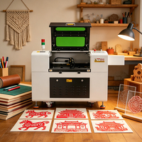 Machine de découpe et gravure laser CO2 CNC haute précision 6040 pour matériaux non métalliques, contrôleur Ruida, connectivité Wi-Fi/USB, refroidissement par eau