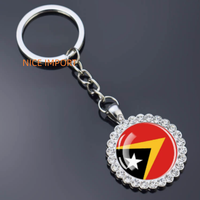 Porte-clés fleur en strass drapeau Papouasie-Nouvelle-Guinée, très populaire, pour sac à dos, décoration de clés, breloque de portefeuille, souvenir de voyage
