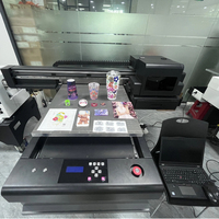Impresora UV DTF de Formato Pequeño para Escritorio 6090 de Doble Uso: Impresión Directa y Transferencia de Película para Botellas Cilíndricas, Bolígrafos y Tazas