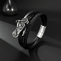 Bracelet à boucle magnétique en cuir tressé européen américain fait à la main pour hommes en acier inoxydable breloque à la mode pour hommes
