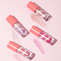Vente en gros de brillant à lèvres naturel végan pour filles, texture tourbillon unique, fruit en vrac, brillant à lèvres magique hydratant mignon