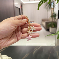Porte-clés en alliage personnalisé avec pendentif en forme de cœur d'étoile de mer coloré de dessin animé, petit cadeau promotionnel