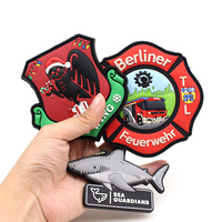 Insigne 3D gaufré en caoutchouc de silicone personnalisé du fabricant Écussons en PVC souple avec logo Écussons en PVC personnalisables