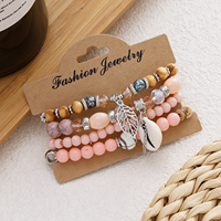 Bracelet Bohème Superposé Perles de Riz Colorées Coquillages Feuilles Bracelet de Luxe en Cristal et Pierres Géométriques pour Femme Cadeau