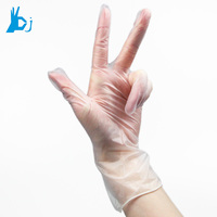 Gants jetables de ménage de PVC dans les gants jetables de vinyle de couleur claire