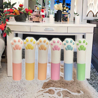 Stick à lèvres en plastique imprimé rose en forme de patte de chat 4G avec applicateur cosmétique